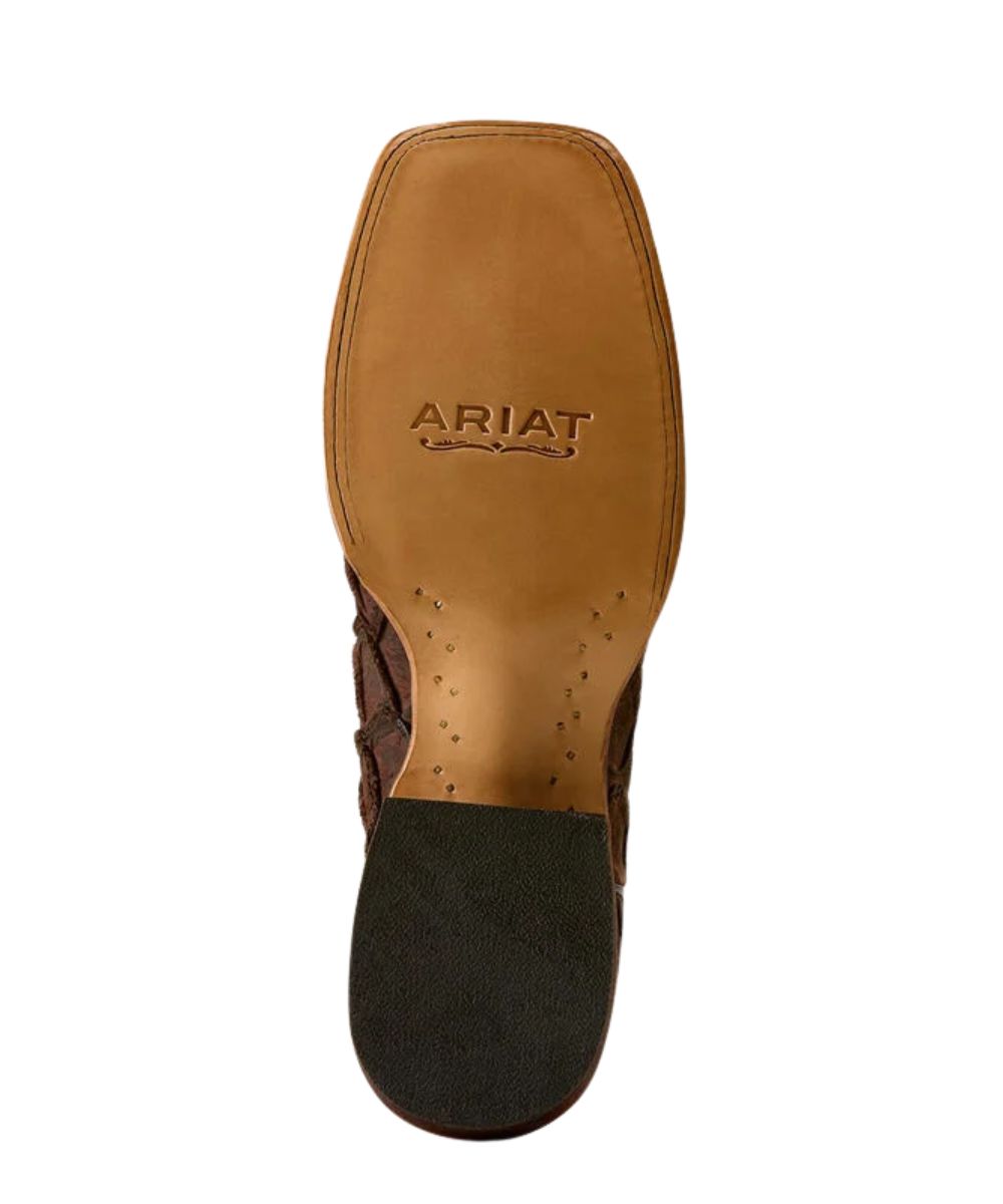 Top-down view of a brown leather boot sole with the brand name ARIAT embossed in the center, featuring a black rubber heel.