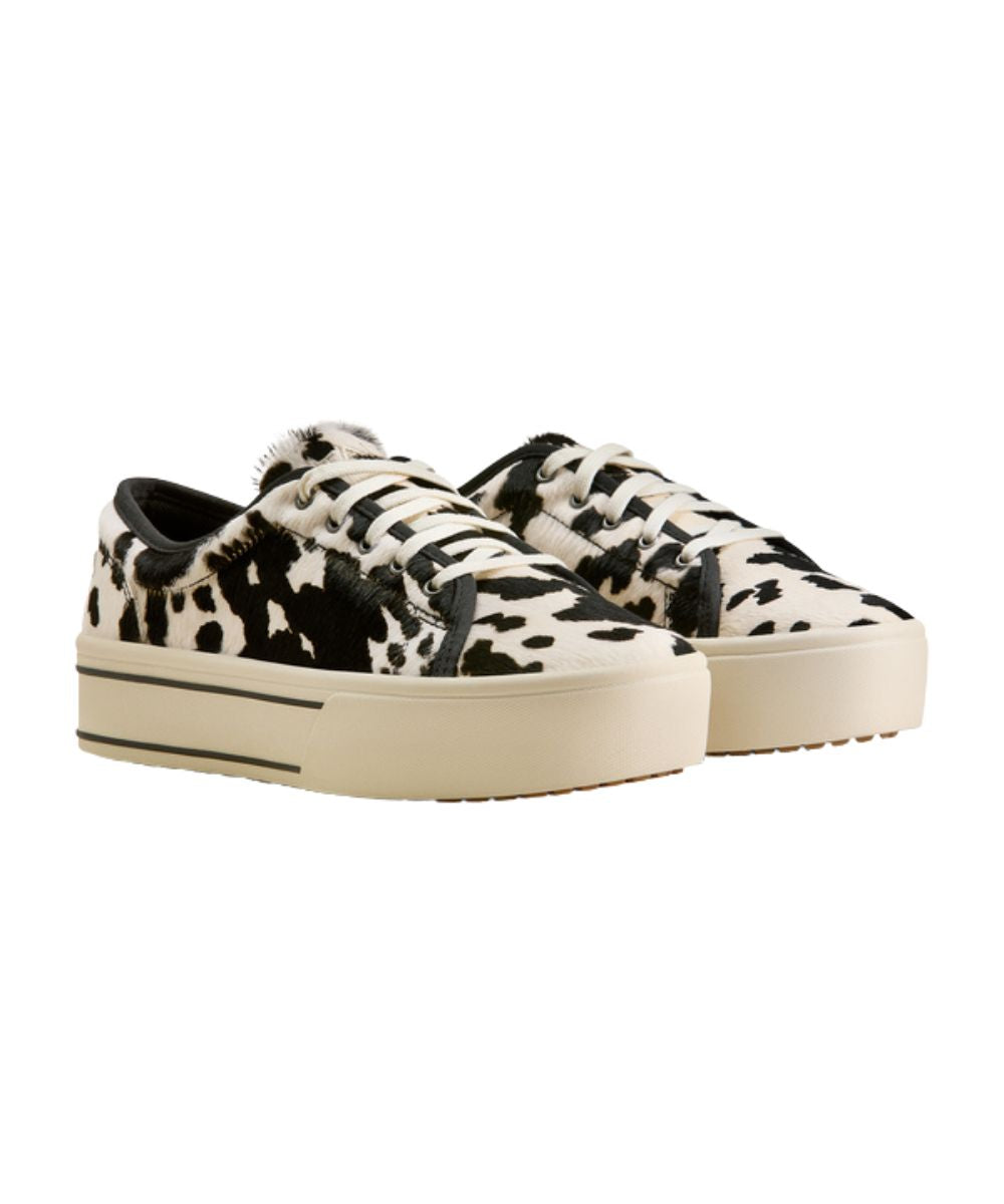 Right angled view of the women's Ariat Black & White Hair-On Skylar Shoe featuring the leather cowhide upper and lace-up entry