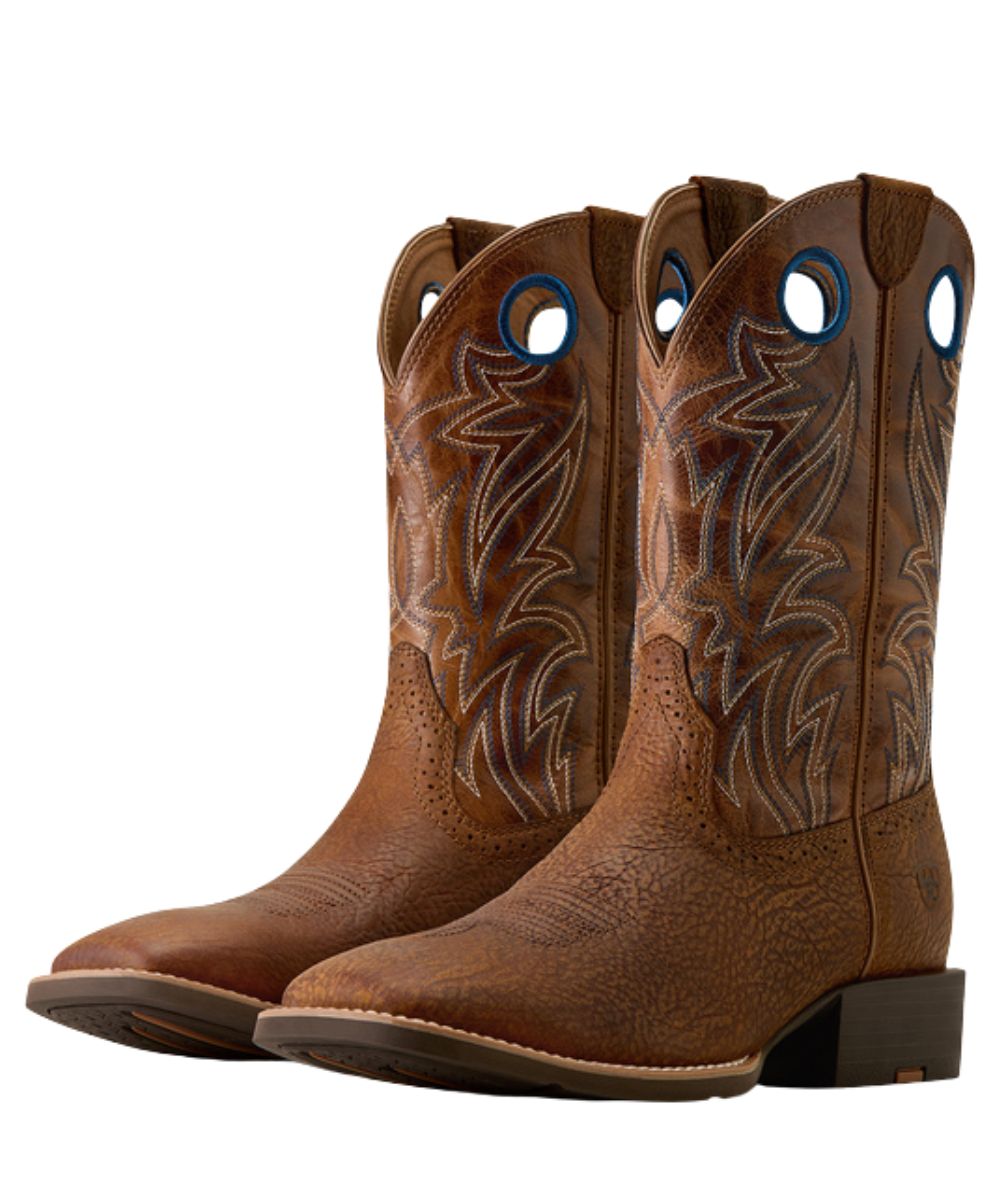Pair view of the men's sport sidebet 11" leather cowboy boot in toasted grain brown featuring the blue contrast accents