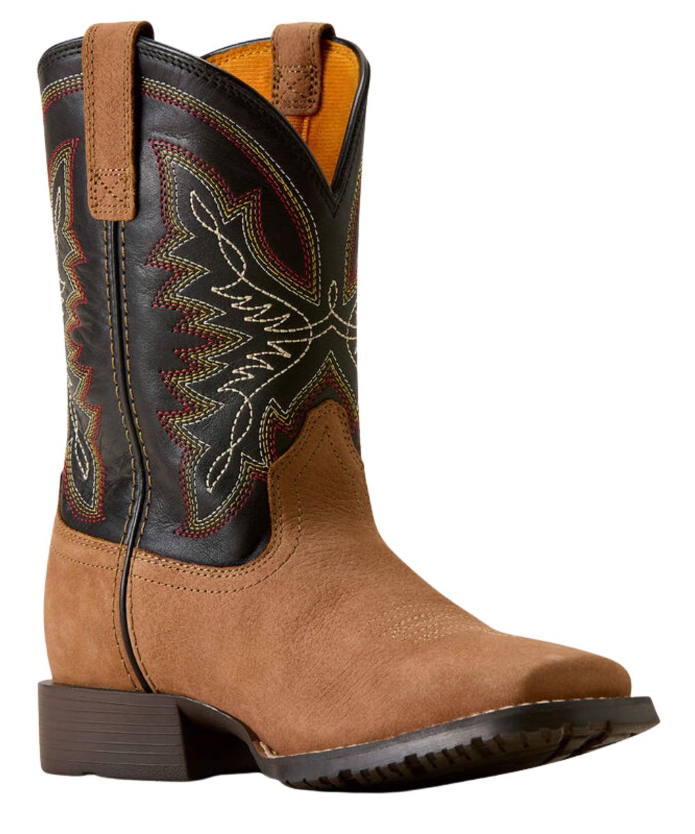 A western cowboy boot featuring a tan suede lower section and a black leather shaft with multicolor embroidered stitching, set against a plain white background.