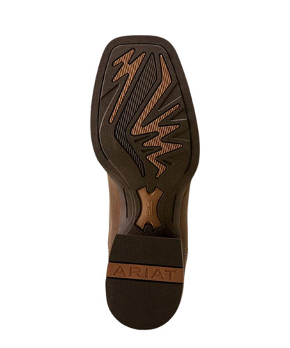 The outsole of a brown Ariat boot, showing a square toe with a textured tread pattern and the brand name 'ARIAT' embossed on the heel.