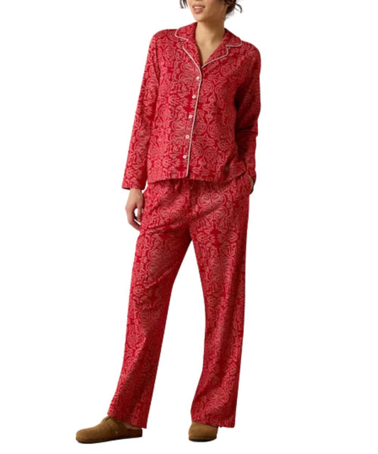 Front view of the women's red Ariat Boot Scootin' Dreams Pajama Set featuring the matching shirt and pants with an allover white western stitch design print and relaxed fit