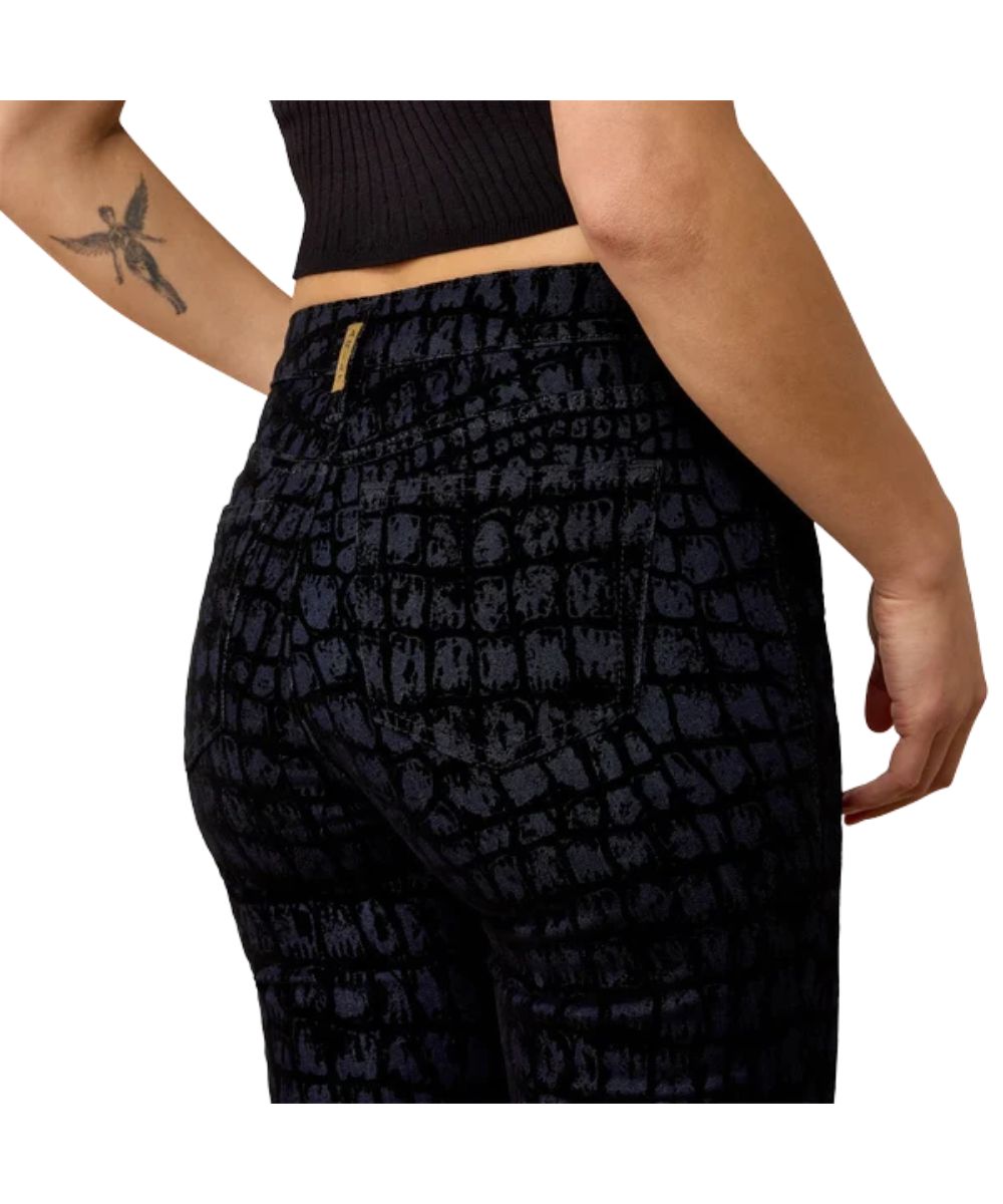 Close-up view of the back pockets and contoured waistband