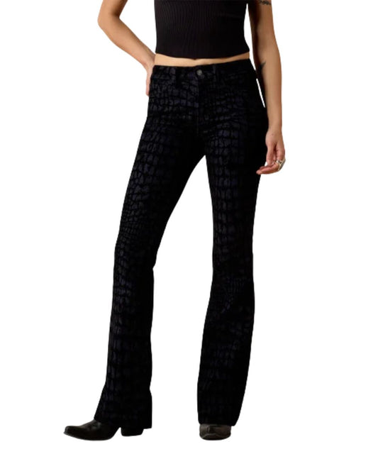 Front view of the women's black Ariat High Rise Midnight Luxe Slim Trouser Jean featuring the 10" front rise, contoured waistband, and tonal gator-inspired print