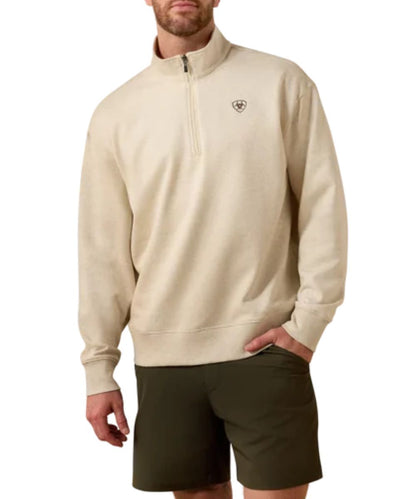 Front view of the men's oatmeal heather Ariat long sleeve pullover sweatshirt featuring the mock collar, 1/4 zip closure, and the small Ariat Shield logo embroidered at the left chest