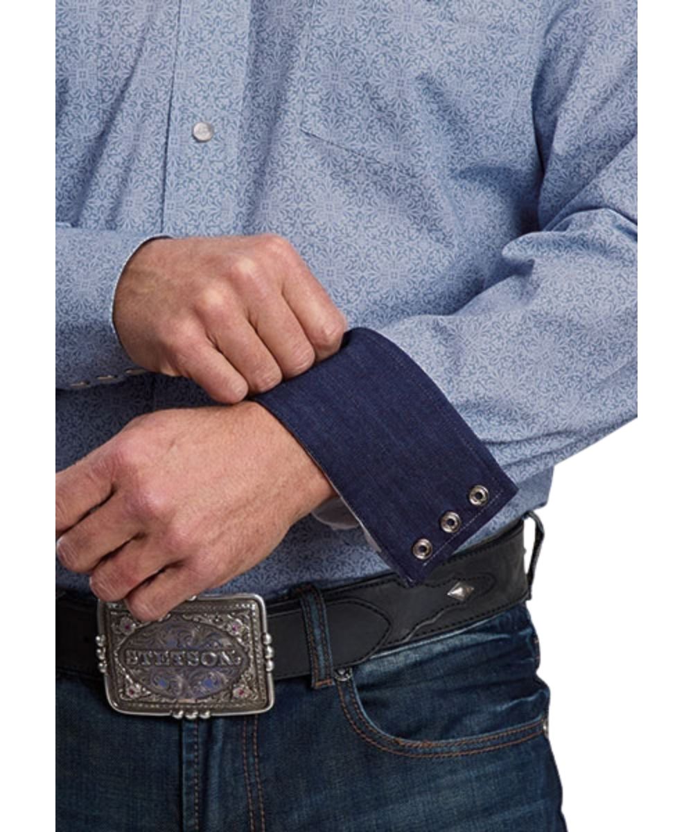 Close-up view of the geometric filigree poplin print and the dark denim contrast interior trim