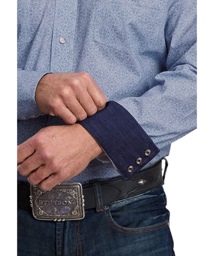 Close-up view of the geometric filigree poplin print and the dark denim contrast interior trim