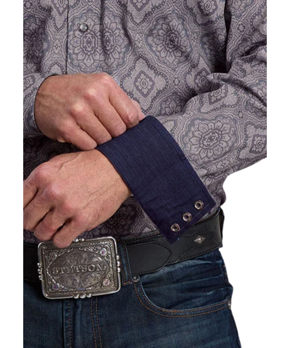 Close-up view of the grey medallion paisley print and the contrast interior denim trim