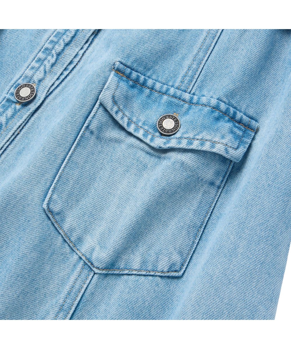 Close-up view of the button-through flap patch pockets
