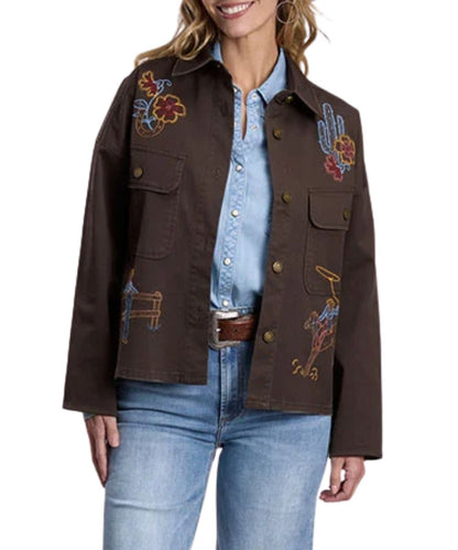 Front view of the women's brown Stetson Canvas Utility Jacket featuring the dropped shoulders, button front closure, large patch button-through flap chest pockets, and decorative western embroidery