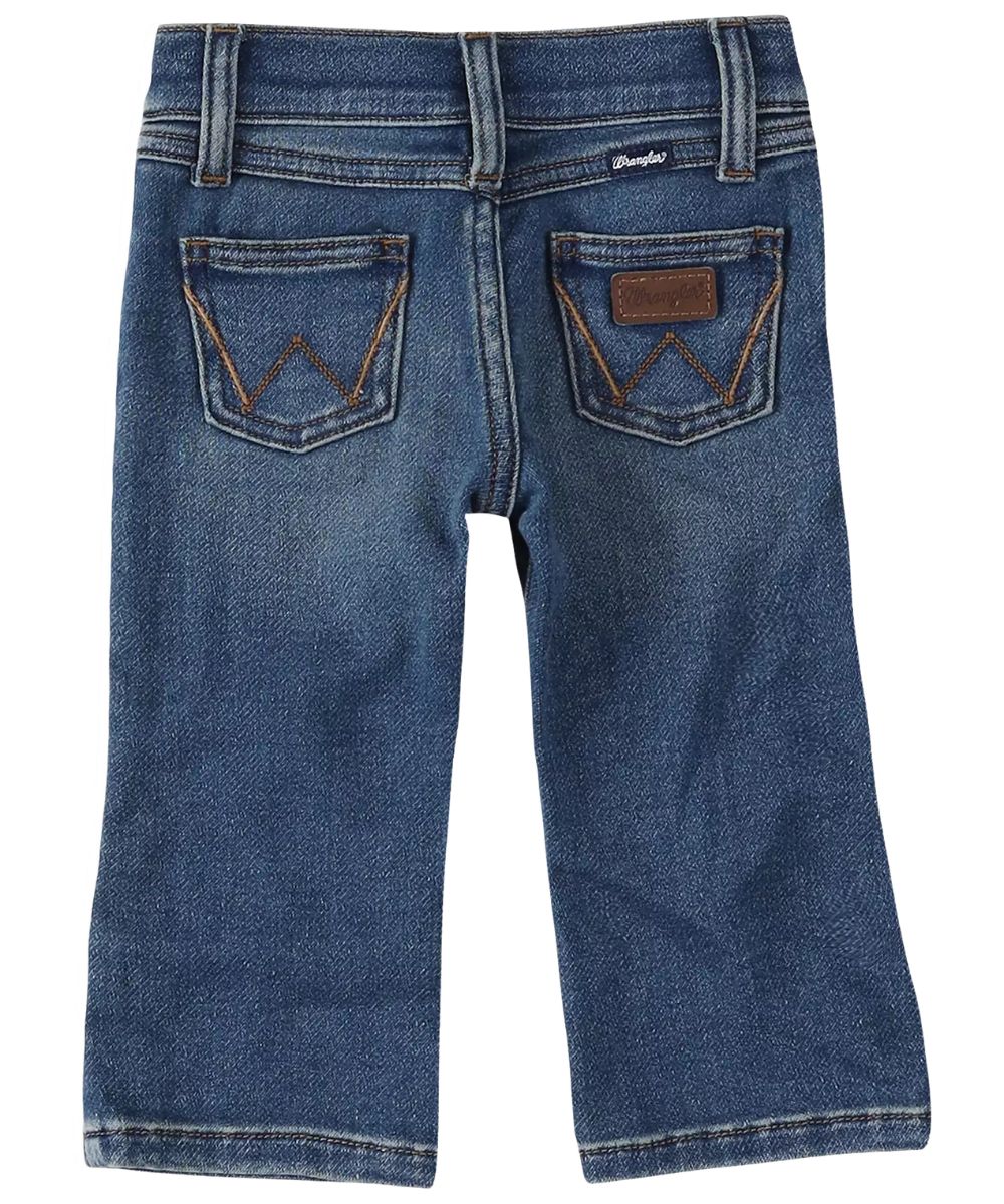 Back view of the little boy's western jean featuring a medium wash, 'w' logo stitched back pockets, and a logo patch