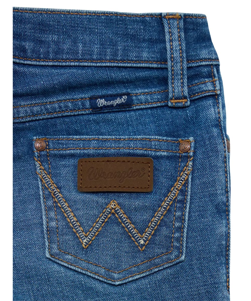 Close-up view of the logo stitched back pockets with a leather logo patch