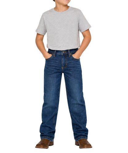 Model view of the boy's Wrangler Retro Jackson Hole Relaxed Boot Cut Jean in a dark wash