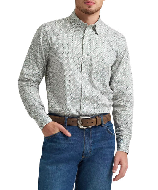 Men's Wrangler classic fit, long sleeve, button down shirt, in a green and tan cross print from the Cody Johnson collection.
