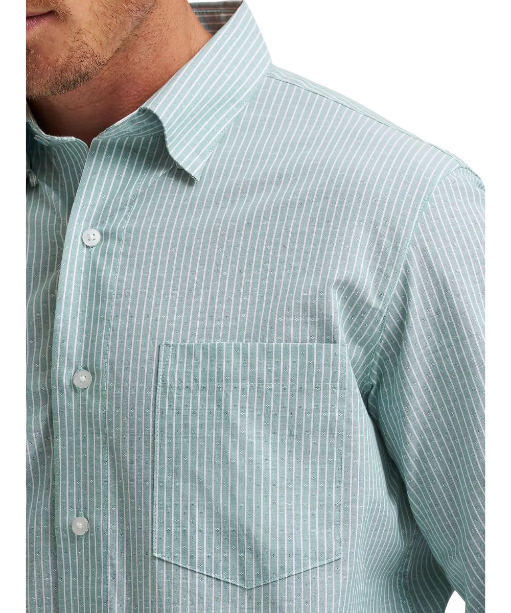 Close-up view of the green and white moss striped print shirt featuring a single open chest pocket and a hidden button-down collar.