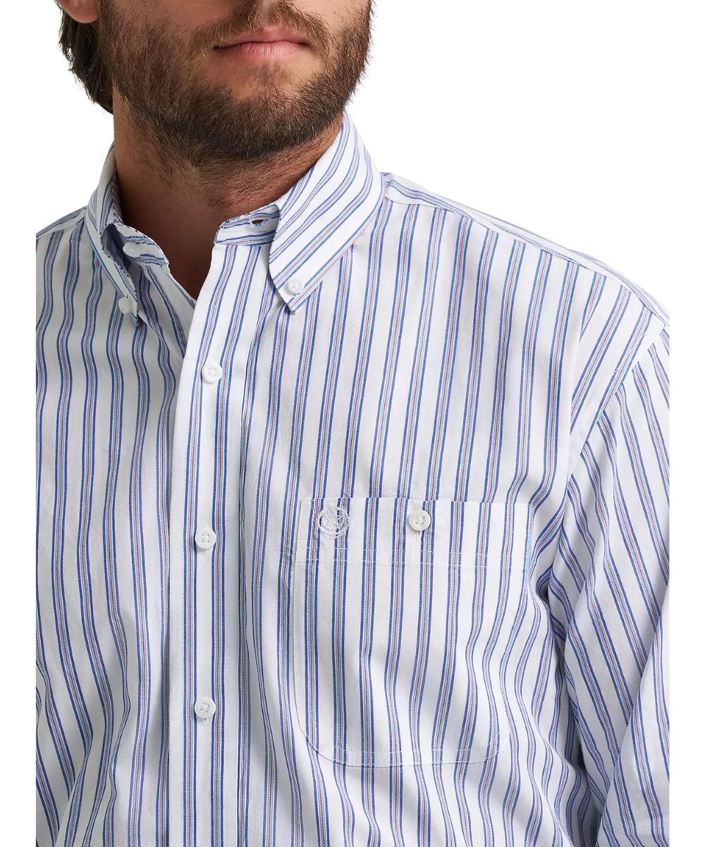 Close-up view of the white button down shirt featuring a striped blue print, single button-through chest pocket, and button down collar.