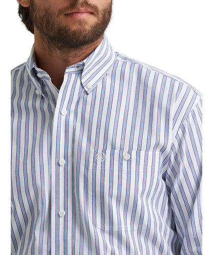 Close-up view of the white button down shirt featuring a striped blue print, single button-through chest pocket, and button down collar.
