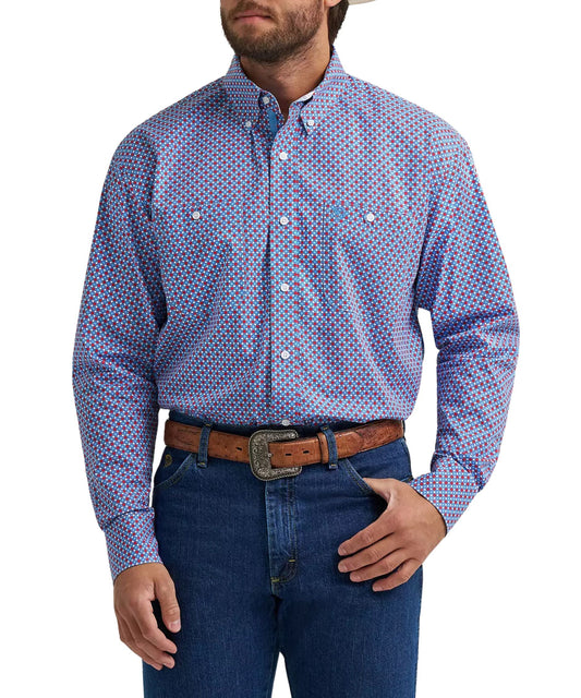 Wrangler men's long sleeve button down shirt from the George Strait collection featuring a red, white, and blue geometric sparks print.