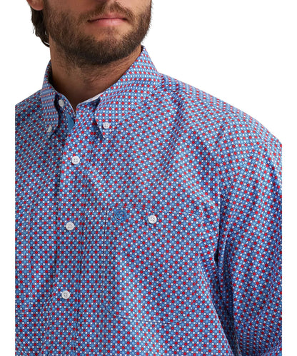 Close-up view of men's sparks printed shirt featuring a button-down collar and button-through chest pockets.