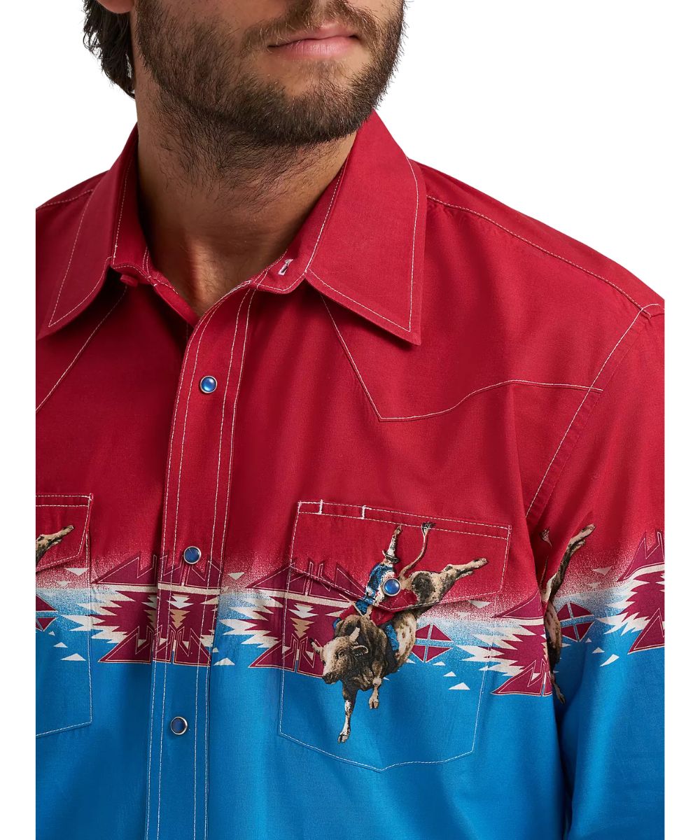 Close-up view of the red and blue Checotah snap shirt featuring a spread collar, snap flap chest pockets, and a pen slot in the left chest pocket.