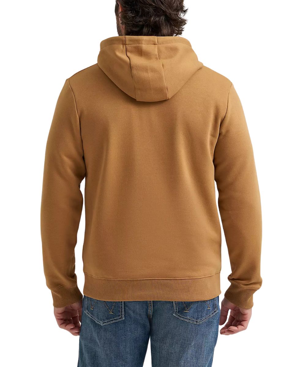 A man viewed from the back wearing a solid tan hooded sweatshirt and blue jeans against a plain white background.