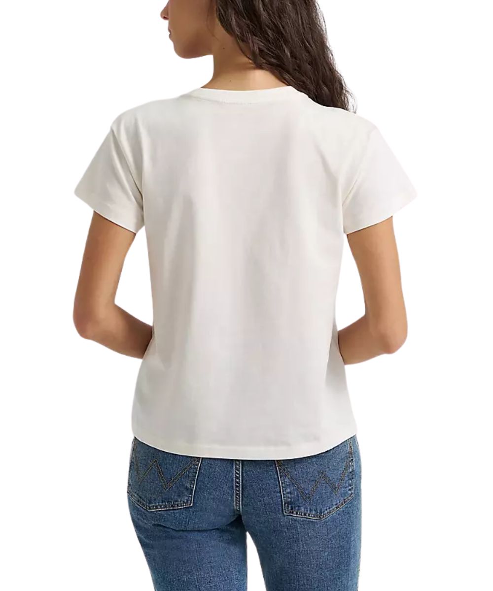 A woman viewed from the back wearing a plain white short-sleeve crewneck T-shirt and blue jeans against a clean white background.