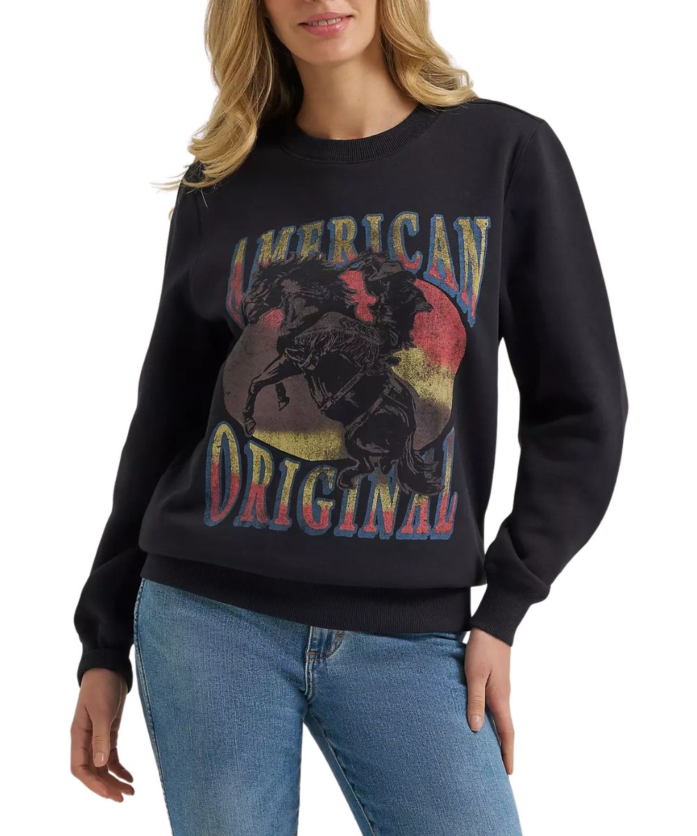 Front view of the women's Wrangler American Original Graphic Fleece Reg Pullover in black beauty featuring the retro inspired front cowboy graphic