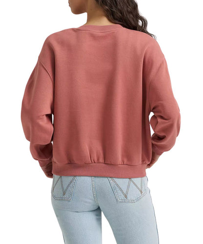 Back view of the women's rose long sleeve crew neck sweatshirt featuring the dropped shoulders and ribbed trim