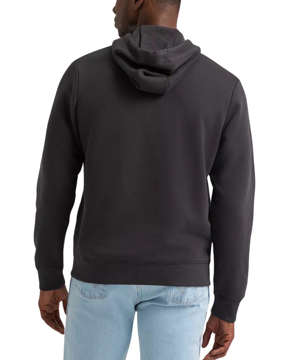 A man wearing a dark charcoal gray pullover hoodie, shown from the back, paired with light blue jeans against a plain white background.