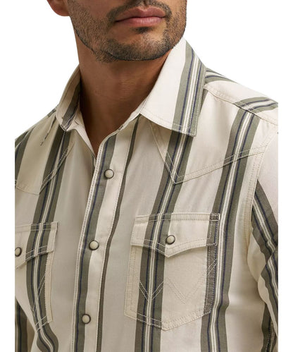 Close-up view of the spread collar, snap flap chest pockets, western yokes, and pearl snaps on the men's green/ecru striped western snap shirt