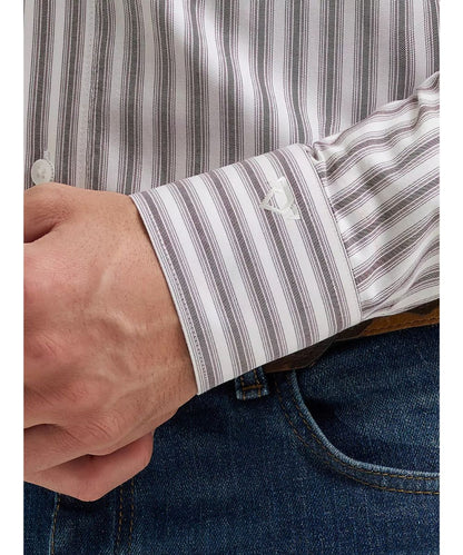 Close-up view of the mitered cuff with cody johnson's signature logo embroidery on the men's wine striped button down shirt