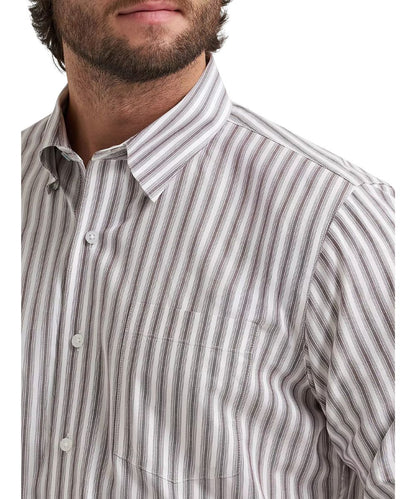 Close-up view of the single open chest pocket, hidden button down collar, and wine stripes print