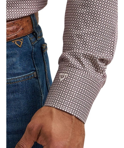 Close-up view of the mitered cuff with cody johnson's signature logo embroidery on the wine clover printed men's shirt in burgundy