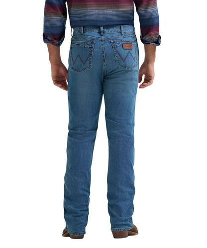 Back view of the men's retro relaxed fit boot cut jean in a dark wash