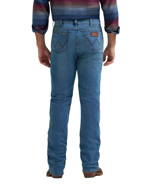 Back view of the men's retro relaxed fit boot cut jean in a dark wash