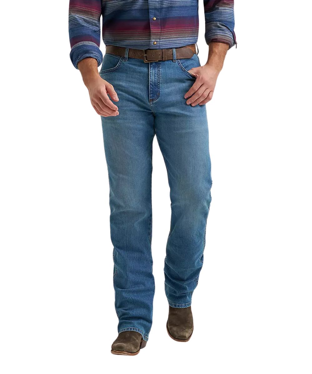 Front view of the men's dark wash relaxed fit boot cut jean featuring a mid rise