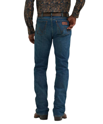 Back view of the men's retro slim boot cut jeans in a dark wash