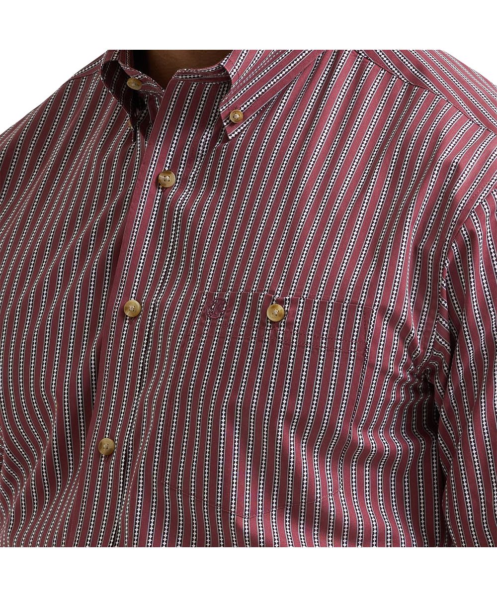 Close-up view of the men's long sleeve red shirt featuring the striped print, single button-through chest pocket, and button down collar