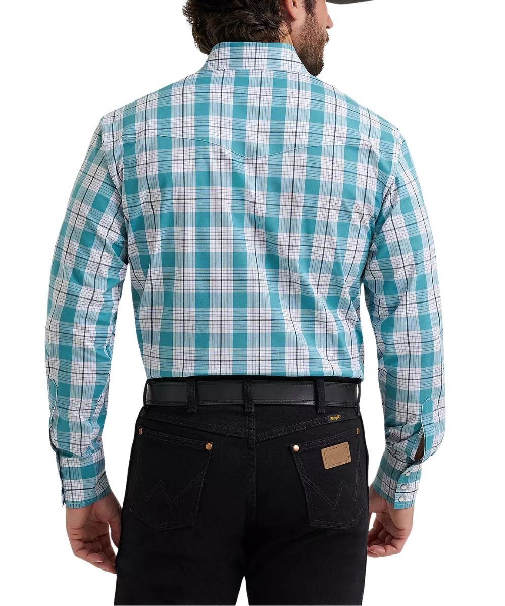 Rear view of a man wearing a turquoise, white, and gray plaid long-sleeve button-down shirt tucked into black jeans with a black belt, on a white studio background.