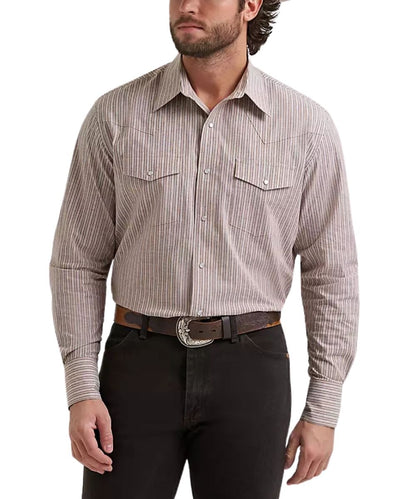A man wearing a long-sleeve western-style button-up shirt with thin vertical stripes in beige and cinnamon, paired with black pants and a brown belt with a silver buckle, against a plain white background.