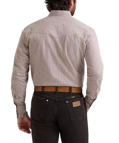 Rear view of a man wearing a long-sleeve button-down shirt with thin vertical stripes in beige and cinnamon, paired with dark jeans and a brown belt, against a plain white background.