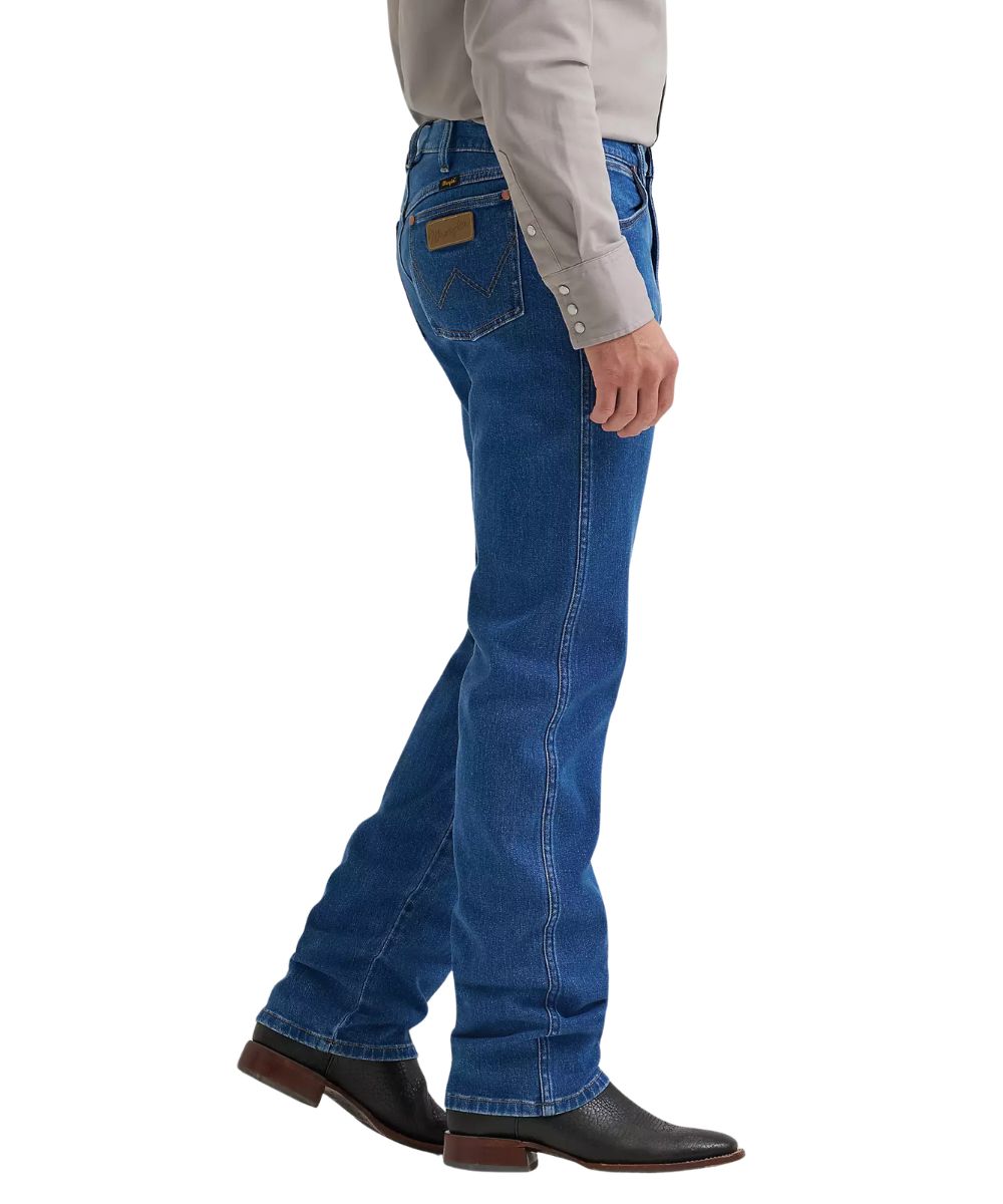 Side view of the men's stonewash boot cut jean featuring the 16 3/4" leg opening