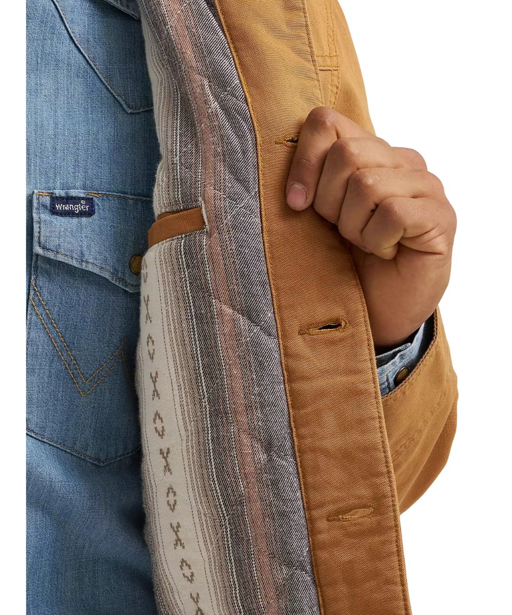 Close-up view of the diamond quilted flannel lining and interior pocket