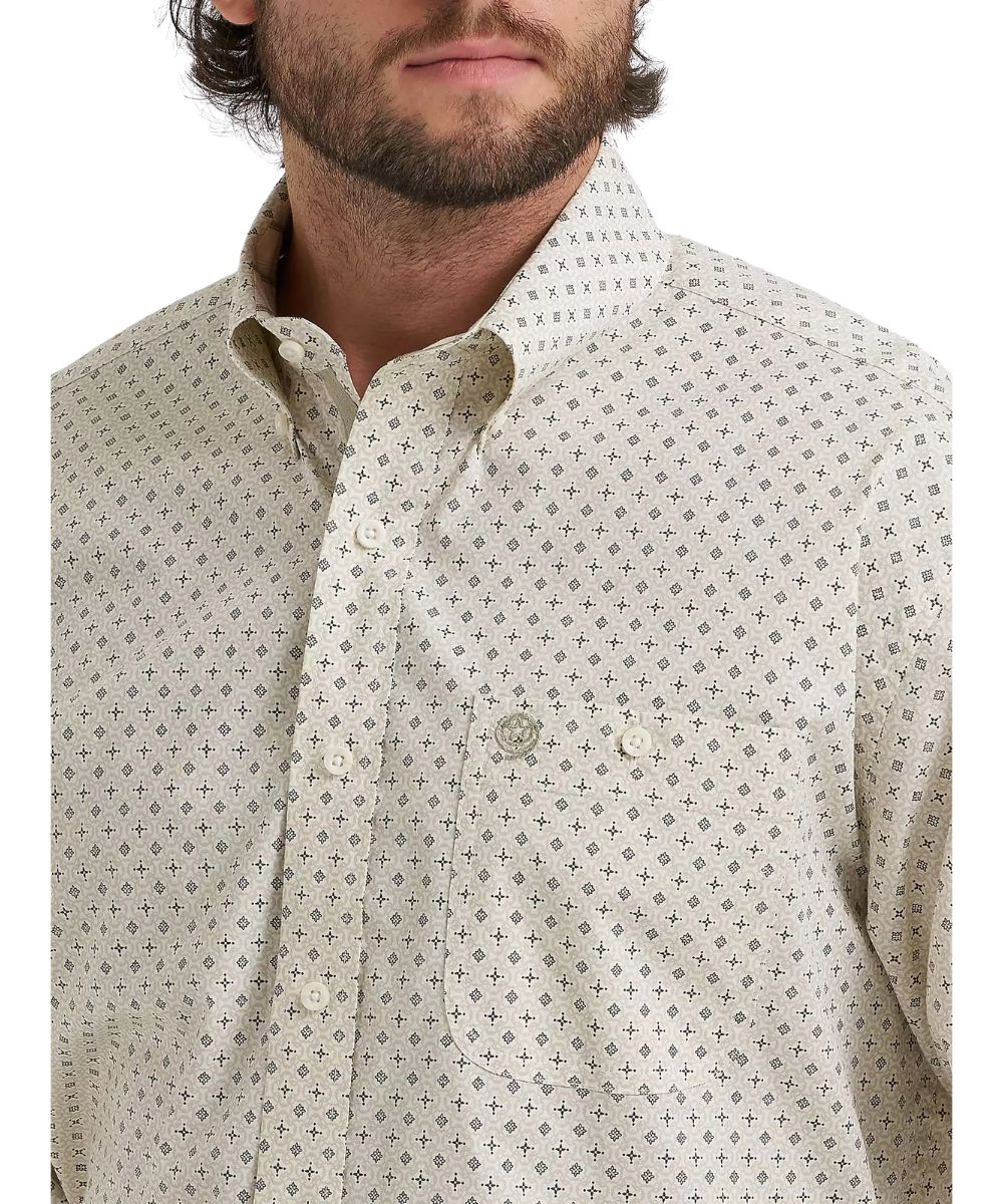 Close-up view of the single button-through chest pocket and button down collar