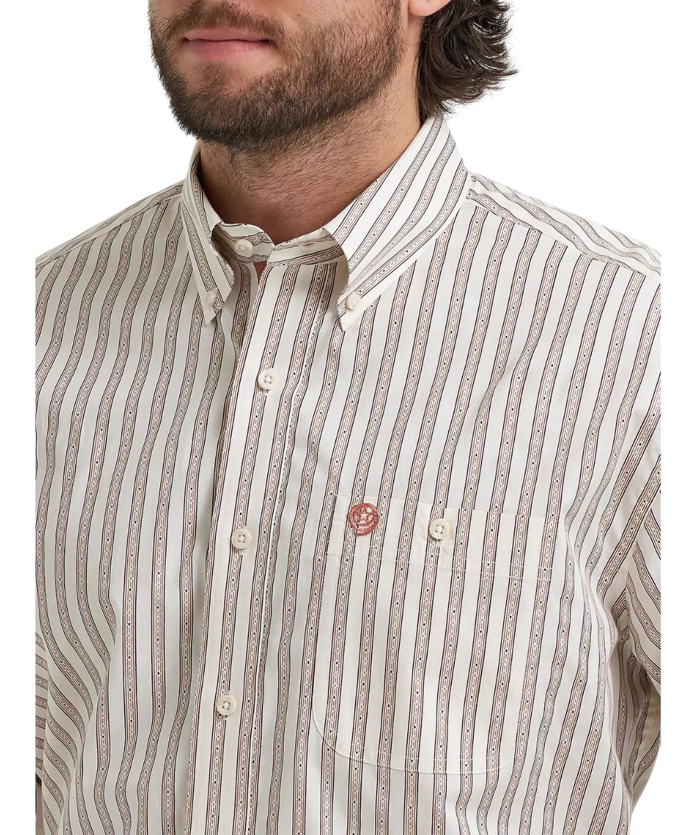 Close-up view of the rusted stripe print, the single button-through chest pocket, button down collar, on the men's relaxed fit shirt