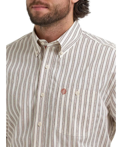 Close-up view of the rusted stripe print, the single button-through chest pocket, button down collar, on the men's relaxed fit shirt