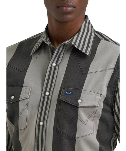 Close-up view of the brushpopper striped print featuring the pearl snaps, snap flap chest pockets, western yokes, and pen slot