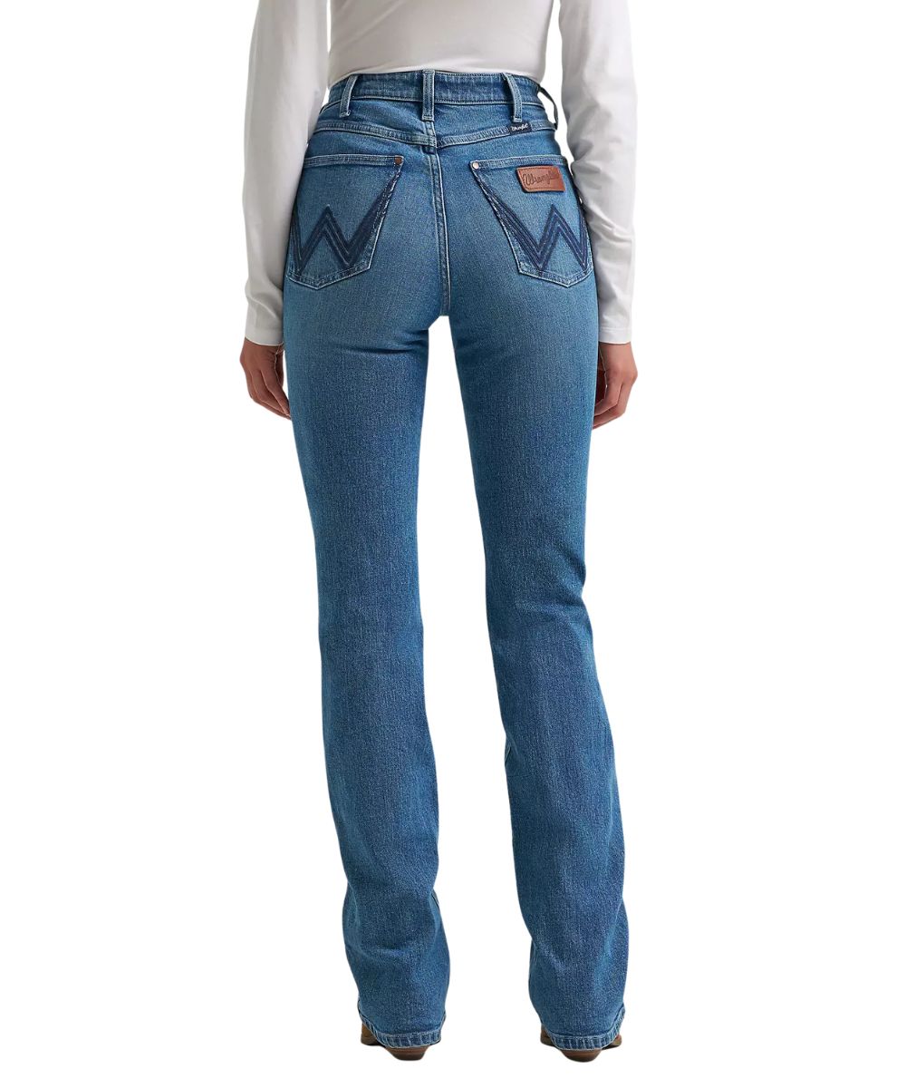 Back view of the women's retro boot cut jean in a medium wash