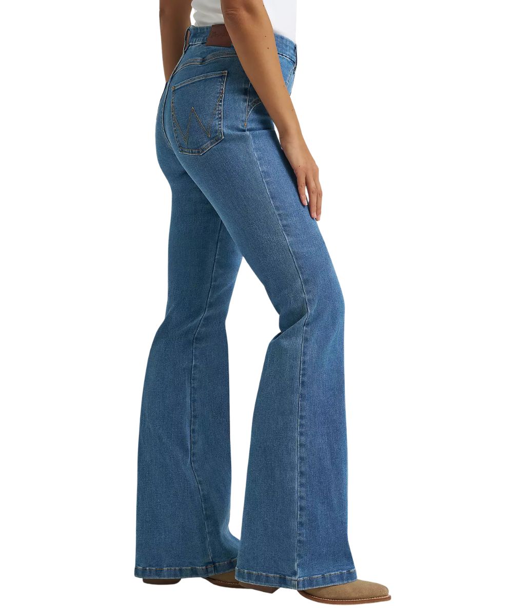 Side view of the women's light wash flare jean
