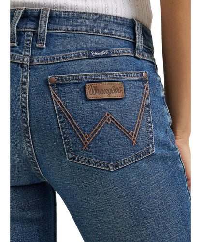 Close-up view of the 'w' logo embroidered back pockets with a leather logo patch